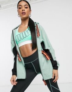 Puma Running First Mile belted jacket in green