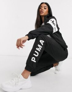 Puma XTG track pants in black