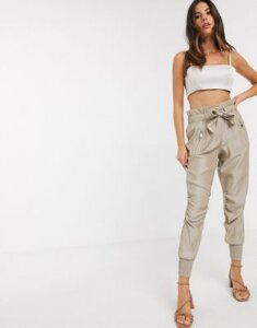 River Island ruched satin tie waist jogger pants in beige-Pink