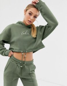 The Couture Club cropped motif drawstring hoody in khaki-Green