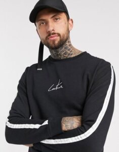 The Couture Club definition taped sweater in black