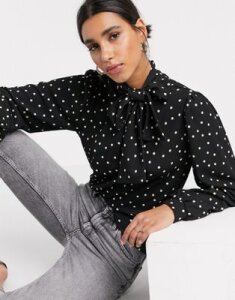 Vero Moda volume sleeve tie blouse in monochrome polka dot-Black
