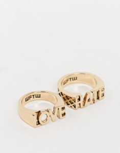 WFTW slogan ring set in gold with love hate text
